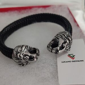 Black Bracelet with Silver Lion Heads